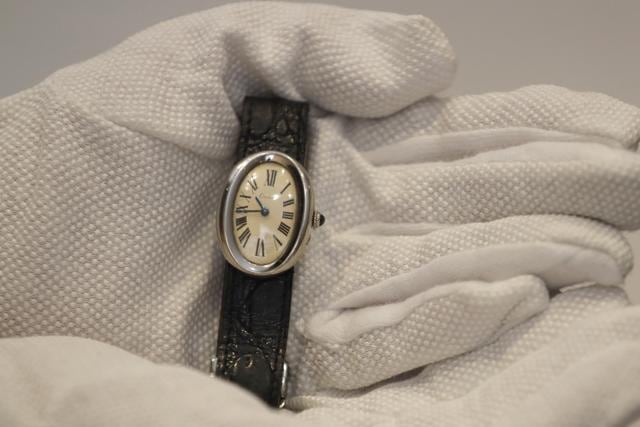 A Cartier wristwatch,1966, owned by Beatles manager Brian Epstein is displayed at Sotheby's auction rooms in London. (AP) A Cartier wristwatch,1966, owned by Beatles manager Brian Epstein is displayed at Sotheby's auction rooms in London. (AP)