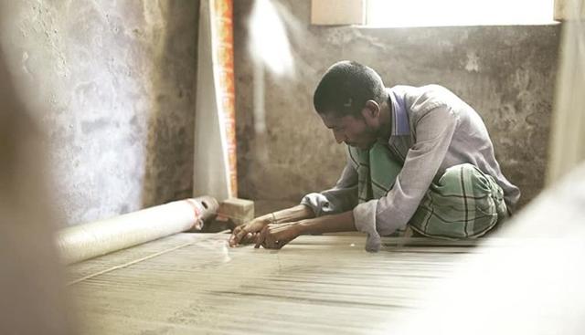 Designer Gautam Gupta clicks a weaver in Varanasi. Designer Gautam Gupta clicks a weaver in Varanasi.