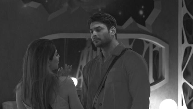 Nikki Tamboli coaxing Sidharth Shukla. Nikki Tamboli coaxing Sidharth Shukla.