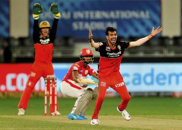 Kings XI Punjab batsman Mayank Agarwal bowled by RCB spinner Yuzvendra Chahal during IPL 2020 cricket match. (PTI)
