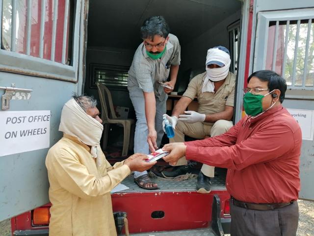 Postal staff has also helped distribute money to the needy, during the time when they couldn’t got to the bank due to the pandemic. (PHOTO: Twitter/ IndiaPost) Postal staff has also helped distribute money to the needy, during the time when they couldn’t got to the bank due to the pandemic. (PHOTO: Twitter/ IndiaPost)