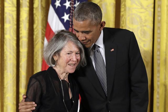 President Barack Obama embraces poet Louise Gluck before awarding her the 2015 National Humanities Medal during a ceremony in the East Room of the White House, in Washington. (AP Photo/Carolyn Kaster, File) President Barack Obama embraces poet Louise Gluck before awarding her the 2015 National Humanities Medal during a ceremony in the East Room of the White House, in Washington. (AP Photo/Carolyn Kaster, File)