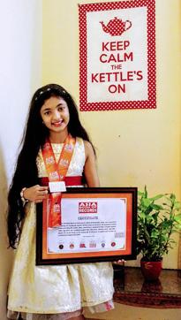 Saanvi M Prajit, daughter of Wing Commander of Indian Air Force Prajit Babu and Manjma hailing from Ernakulam, who has been recognised by the Asia Book of Records and the India Book of Records. (PTI) Saanvi M Prajit, daughter of Wing Commander of Indian Air Force Prajit Babu and Manjma hailing from Ernakulam, who has been recognised by the Asia Book of Records and the India Book of Records. (PTI)
