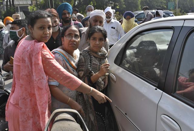 Bullets marks on a car after the robbers opened fire. (Harsimar Pal Singh/HT)