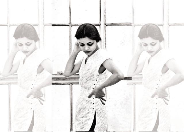 A girl dressed in a khadi garment designed and printed by David