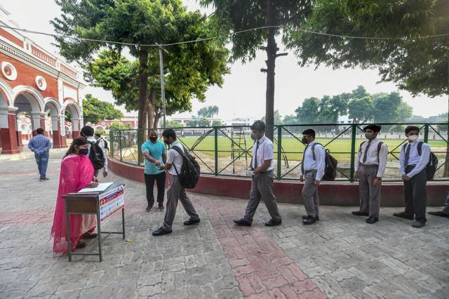 Students in Lucknow queue up maintaining social distancing (PTI) Students in Lucknow queue up maintaining social distancing (PTI)