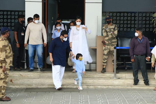 Kareena Kapoor, Saif Ali Khan and Taimur at the airport. Kareena Kapoor, Saif Ali Khan and Taimur at the airport.