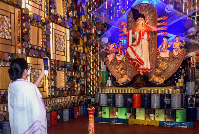 West Bengal Chief Minister Mamata Banerjee inaugurating a Durga Puja pandal in Kolkata on October 18, 2020. (PTI) West Bengal Chief Minister Mamata Banerjee inaugurating a Durga Puja pandal in Kolkata on October 18, 2020. (PTI)