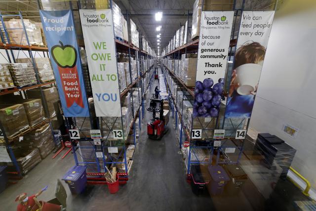 Pallets of various foods are stacked on shelves in the extensive warehouse at the Houston Food Bank. (AP) Pallets of various foods are stacked on shelves in the extensive warehouse at the Houston Food Bank. (AP)