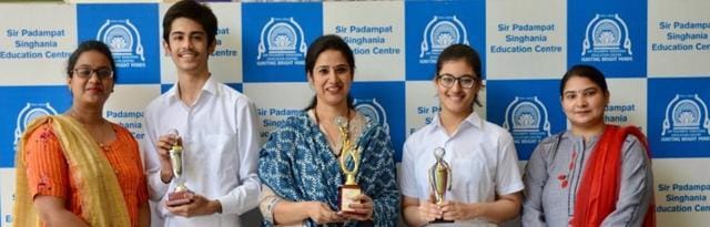 Students with their trophies they won in the KSS Inter-school English Debate Competition (HT Photo) Students with their trophies they won in the KSS Inter-school English Debate Competition (HT Photo)