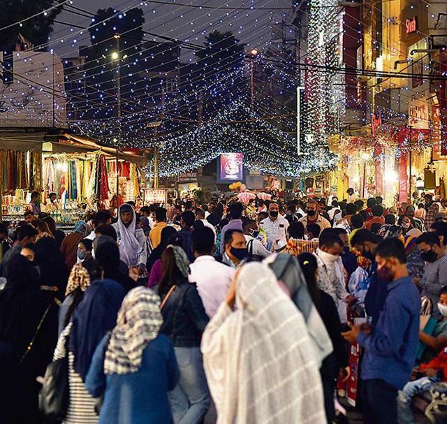 People shop at Lajpat Nagar Central Market amid huge crowds for the upcoming festive season, in New Delhi (Sanjeev Verma/HT Photos)