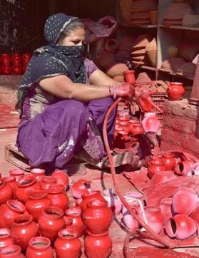 Earthen pots being prepared in Ludhiana on Thursday. (Gurpreet Singh/HT)