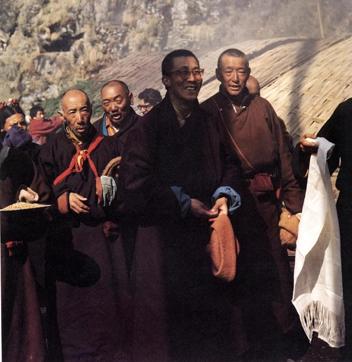 The Dalai Lama arrives in India and is greeted with a khatag or offering scarf. On the right, behind him is his Lord Chamberlain, Phala Thupten Woden. On the left are the Simpon Khenpo (Master of the Robes) and the Chopen Khenpo (Master of the Ritual) (Tibet Museum ) The Dalai Lama arrives in India and is greeted with a khatag or offering scarf. On the right, behind him is his Lord Chamberlain, Phala Thupten Woden. On the left are the Simpon Khenpo (Master of the Robes) and the Chopen Khenpo (Master of the Ritual) (Tibet Museum )