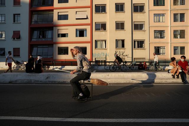 Alessandro Russo rides an electric monowheel called 'nuvem' (cloud), which he invented with his friend Vinicius Sanctus and is inspired by the magic flying brooms of the Harry Potter series, at Minhocao bridge in Sao Paulo, Brazil. (REUTERS) Alessandro Russo rides an electric monowheel called 'nuvem' (cloud), which he invented with his friend Vinicius Sanctus and is inspired by the magic flying brooms of the Harry Potter series, at Minhocao bridge in Sao Paulo, Brazil. (REUTERS)