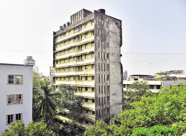Within a stone’s throw away from Churchgate railway station stands the 13-storey international hostel for students vacated two years ago. The structure at Road C near Wankhade Stadium is surrounded by six- or seven-storey residential structures. (Anshuman Poyrekar/HT Photo) Within a stone’s throw away from Churchgate railway station stands the 13-storey international hostel for students vacated two years ago. The structure at Road C near Wankhade Stadium is surrounded by six- or seven-storey residential structures. (Anshuman Poyrekar/HT Photo)
