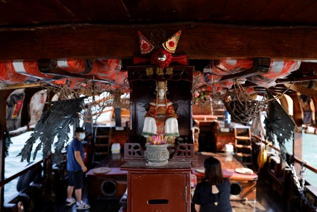 A statue of Mazu, a Chinese sea goddess is seen on the traditional wooden tourist junk boat "Dukling", during the COVID-19 pandemic. (REUTERS) A statue of Mazu, a Chinese sea goddess is seen on the traditional wooden tourist junk boat "Dukling", during the COVID-19 pandemic. (REUTERS)