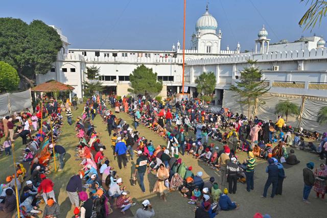 Devotees partaking of langar at Gurdwara Shiri Guru Singh Sabha in Sarabha Nagar, Ludhiana, on Monday. (Harsimar Pal Singh/HT)