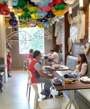 At Yum Yum Cha, guests and staff alike can be seen wearing masks. At Yum Yum Cha, guests and staff alike can be seen wearing masks.