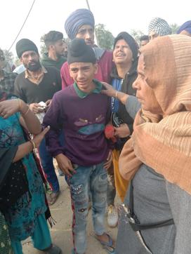 The victims’ youngest son being consoled by relatives in Ludhiana on Sunday. (HT PHOTO) The victims’ youngest son being consoled by relatives in Ludhiana on Sunday. (HT PHOTO)