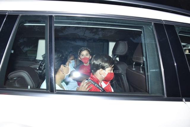 Yash and Roohi Johar with their nannies. Yash and Roohi Johar with their nannies.