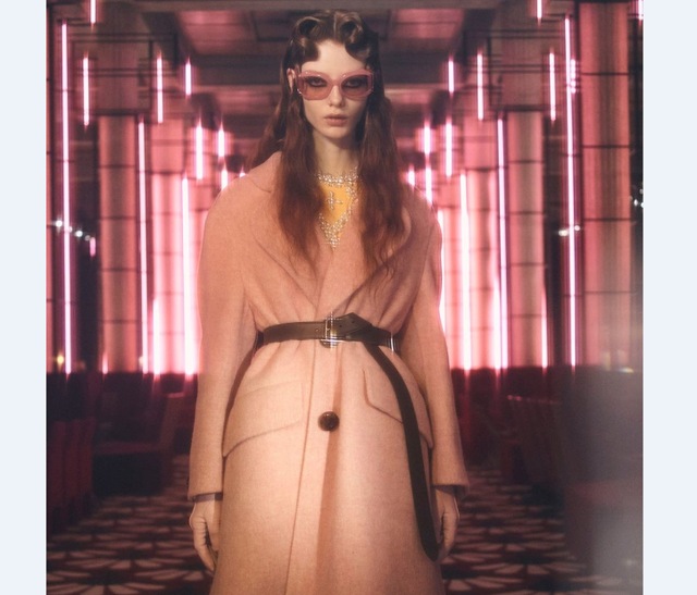 A model in a belted statement coat from Miu Miu AW 20 (Photo: Instagram/MiuMiu)