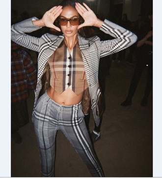 Joan Smalls in a plaid Burberry ensemble (Photo: Instagram/Burberry)