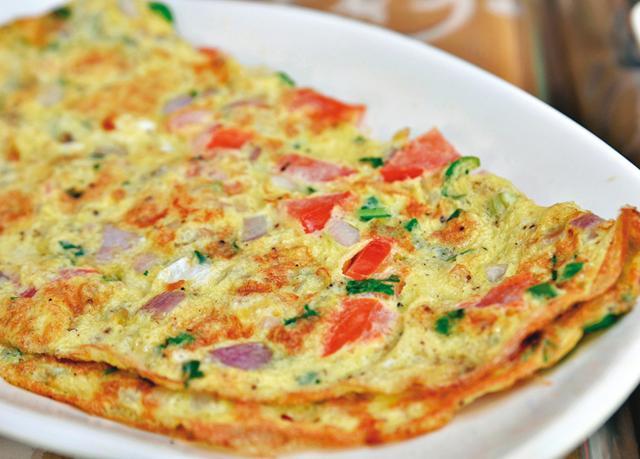 In India, we make omelette without any fuss, with onions, tomatoes and green chillies
