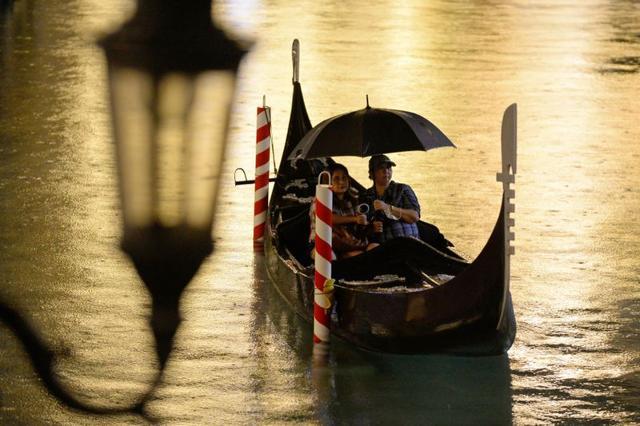 People on a gondola watch a movie in Venice Grand Canal Mall, Taguig City, Metro Manila, Philippines. (REUTERS) People on a gondola watch a movie in Venice Grand Canal Mall, Taguig City, Metro Manila, Philippines. (REUTERS)