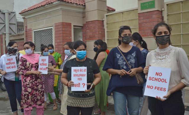 Parents protesting against a private school over charging of fees. (HT FILE)