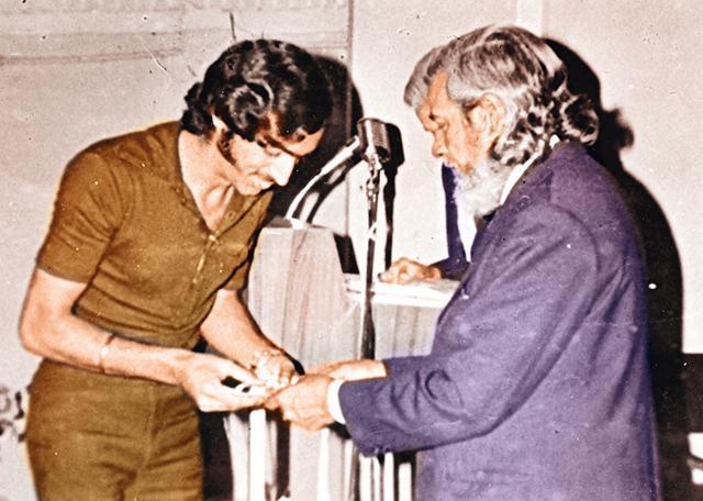At SRCC, receiving an award from his principal for extra-curricular activities At SRCC, receiving an award from his principal for extra-curricular activities