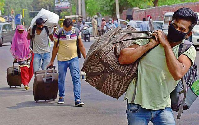 Migrant labourers, who form a major part of the workforce in Ludhiana, leaving for their homes during the lockdown. (HT File) Migrant labourers, who form a major part of the workforce in Ludhiana, leaving for their homes during the lockdown. (HT File)