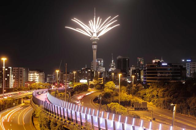 Fireworks are launched from the Sky Tower to mark the changing of the year on New Year's eve in Auckland, New Zealand. (AP) Fireworks are launched from the Sky Tower to mark the changing of the year on New Year's eve in Auckland, New Zealand. (AP)