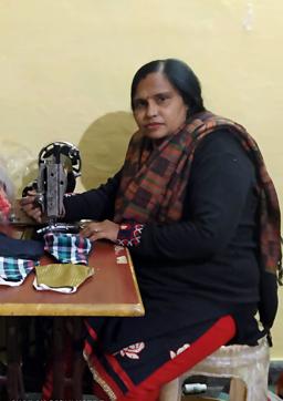 Laxmi Devi, one of the women who is involved in this initiative to stitch masks, is grateful for the work that students have provided her. Laxmi Devi, one of the women who is involved in this initiative to stitch masks, is grateful for the work that students have provided her.