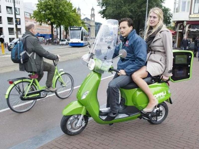 Amsterdam goes green with electric scooter taxis Travel Hindustan Times