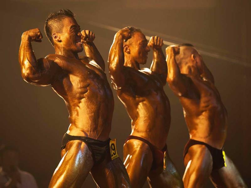 Size matters: Bronzed bodies fight it out in China ...