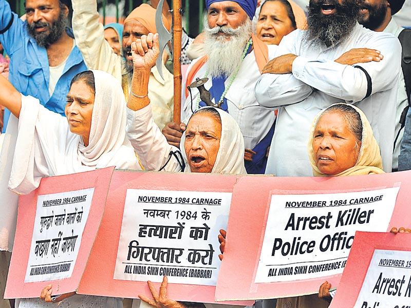 Cancellation of red cards of 1984 riot victims results in protests ...