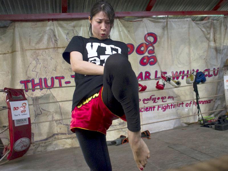 Women are game for Myanmar's ferocious kickboxing style