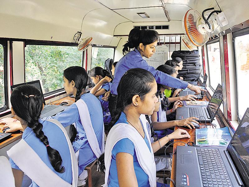 Few laptops and a van take computer education to girls in Noida village