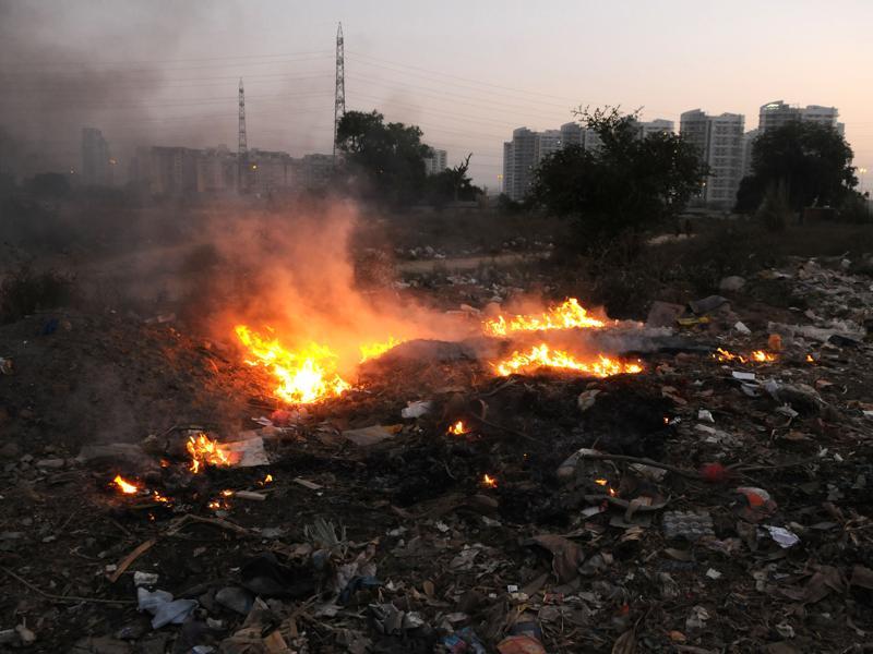 21 fined for open waste burning Hindustan Times