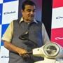 Union Road Transport and Highway Minister Nitin Gadkari unveils the all-new Bajaj Chetak Electric Vehicle, in New Delhi.