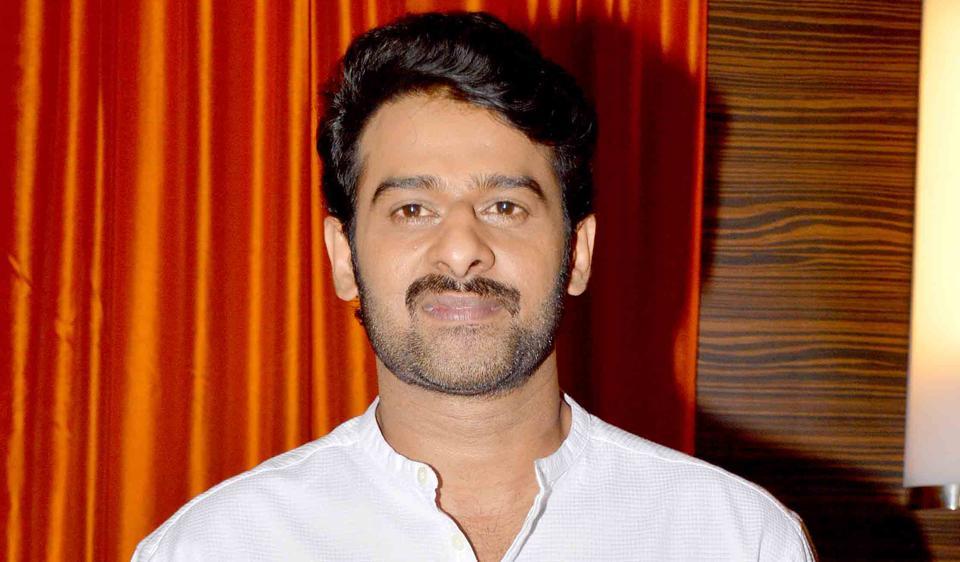 Prabhas fan cuts a special birthday cake, one with the actor’s photo