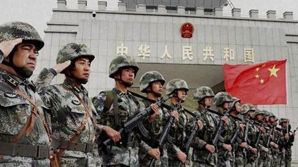 Chinese troops rumble through Xinjiang city in new display | World News ...