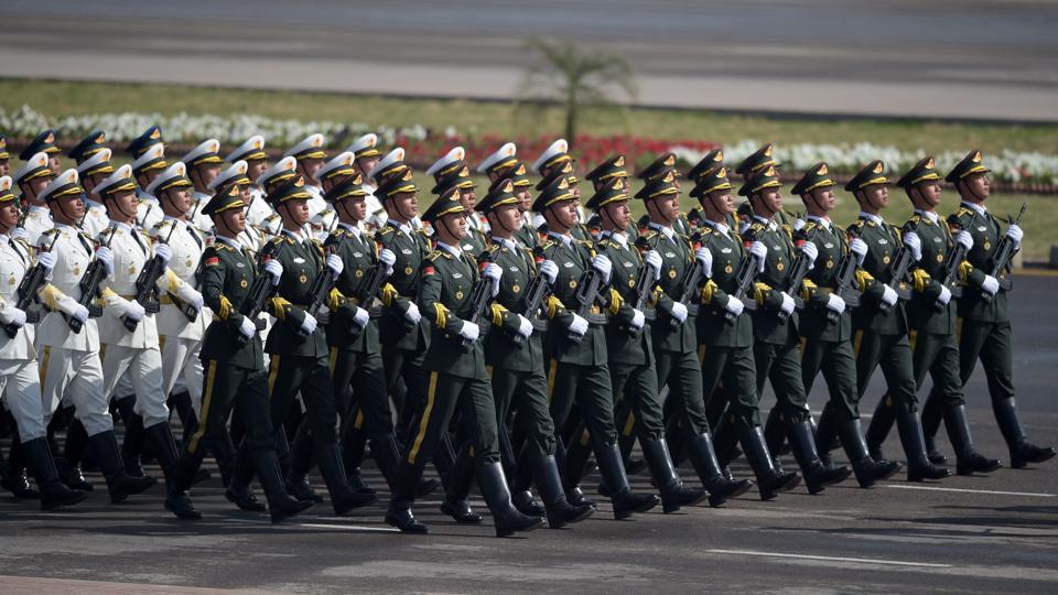 Chinese Saudi troops march in Pakistan Day military parade