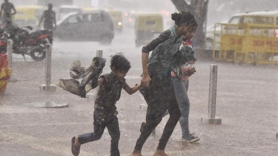 In Pics: Delhi Gets Respite As Rainfall Brings Down Temperature 