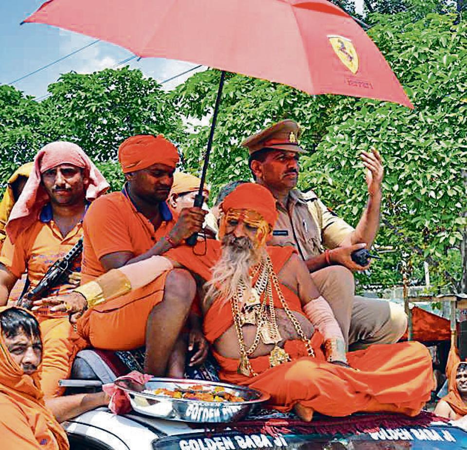 Kanwar yatra Golden Baba is back with 2kg more gold a rolex