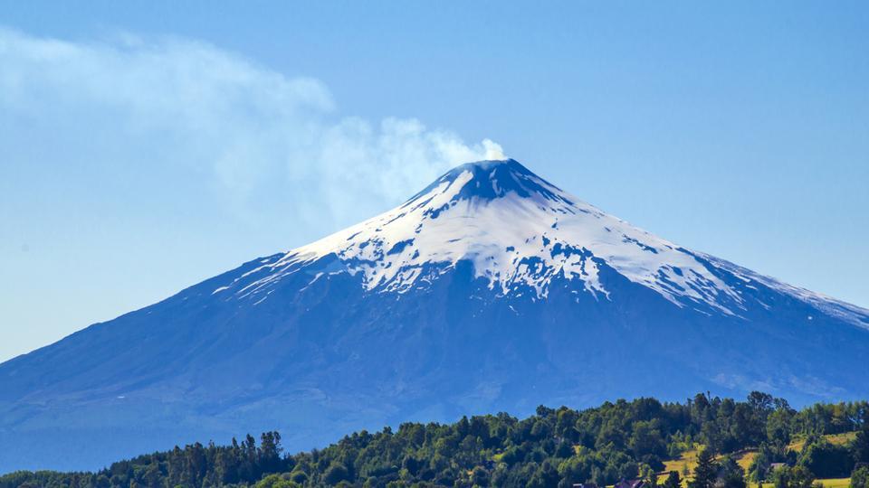 Take an offbeat trip. Visit a mammoth active volcano in Chile | Travel ...