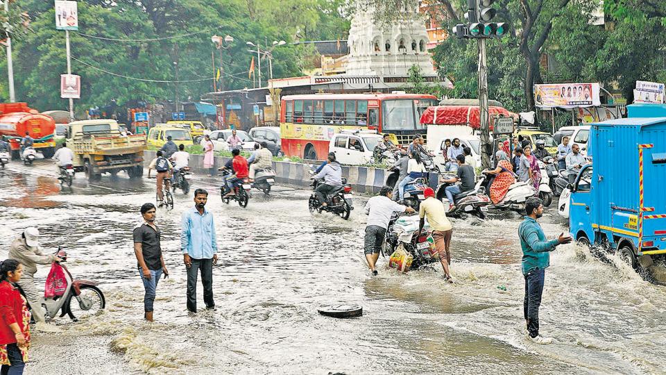 Pune roads flooded, traffic jammed after city receives 101mm rainfall ...