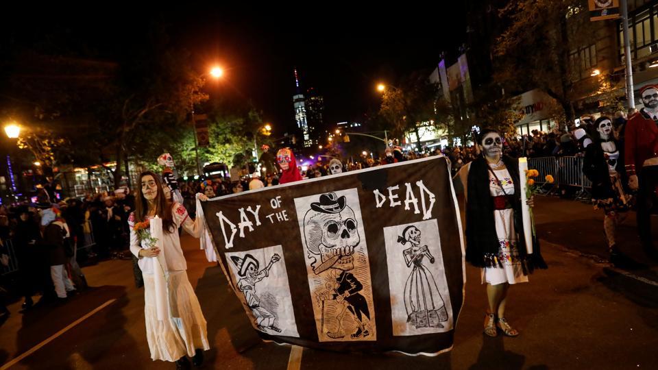 ‘We are not living in fear’ Halloween parade marches on after