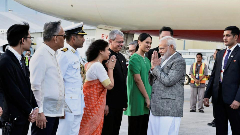 PM Modi visits rice research institute, meets Indian scientists in ...