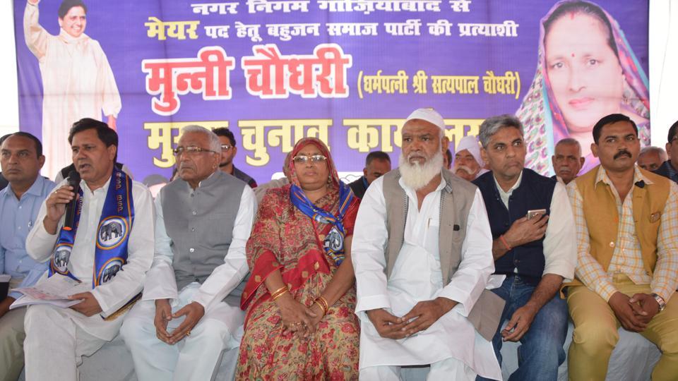 Ghaziabad civic polls BSP candidate rolls our manifesto on Rs100 stamp